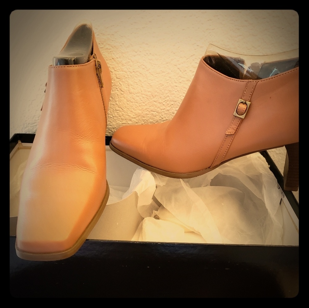 Tan size 7 bootie with 3 inch heel.
